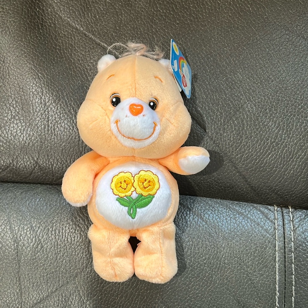 Care Bear Orange Bear with sunflowers